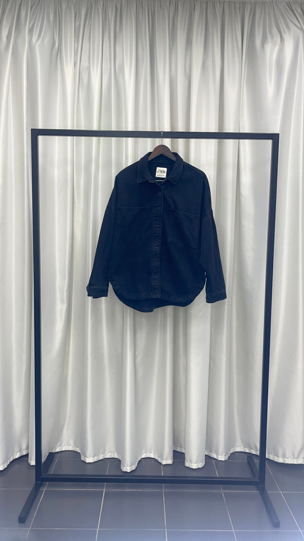 Long sleeve black jacket.